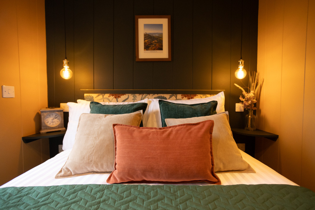 Warm bedroom with layered linen and earthy tones